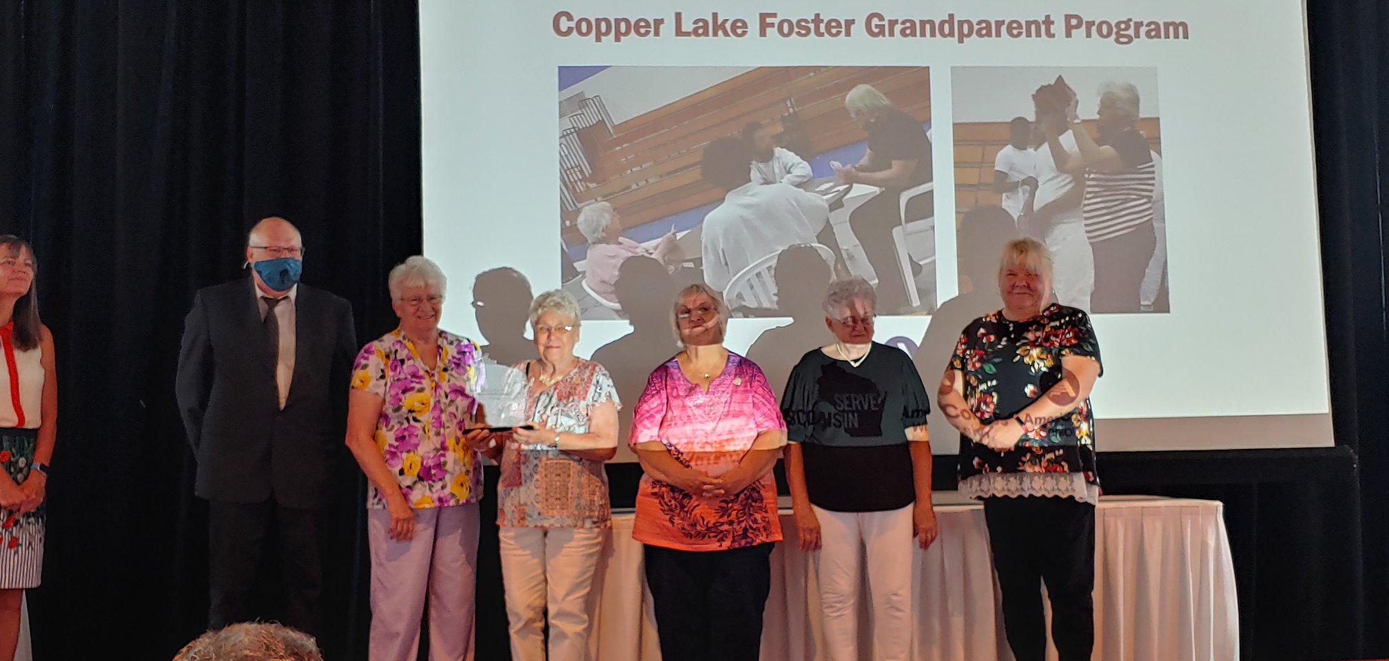 Volunteers in the LHS/CLS Foster Grandparents Program accept their 2021 Governor's Service Award 